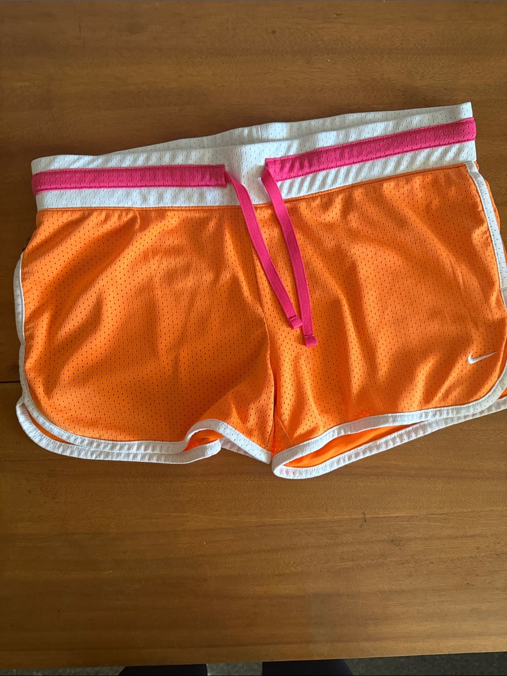 Nike Women's Orange Mesh Athletic Shorts with Pink Trim